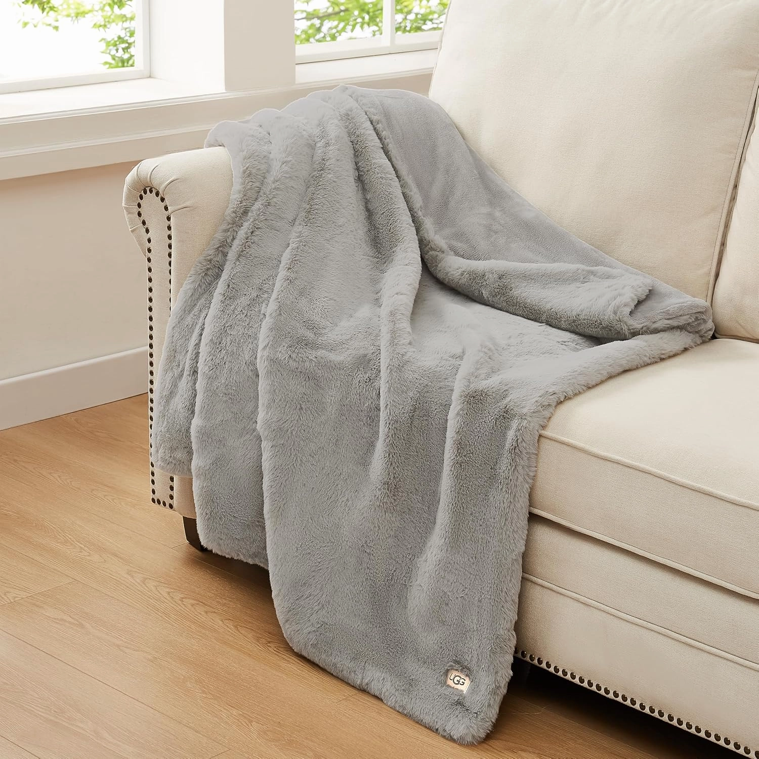 UGG Euphoria Plush Faux Fur Throw Blanket Medium Weight Reversible Luxury Soft Throw for Couch Bed or Chair Hypoallergenic Machine Washable Home Decor Blanket, 50-inch x 70-inch, Seal Light Grey